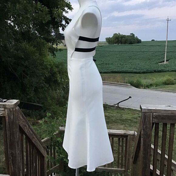 NBD Dresses & Skirts - NBD White Midi Cut Out Sides Fit And Flare Dress Size Large